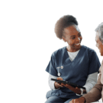 female nurse with elderly man using a tablet