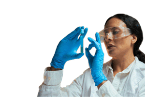 Female researcher looking at vial
